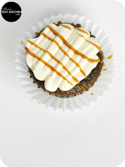 Simply Caramel Candy Bar Cupcakes with Caramel Cream Cheese Frosting | www.momstestkitchen.com | #semihomemade